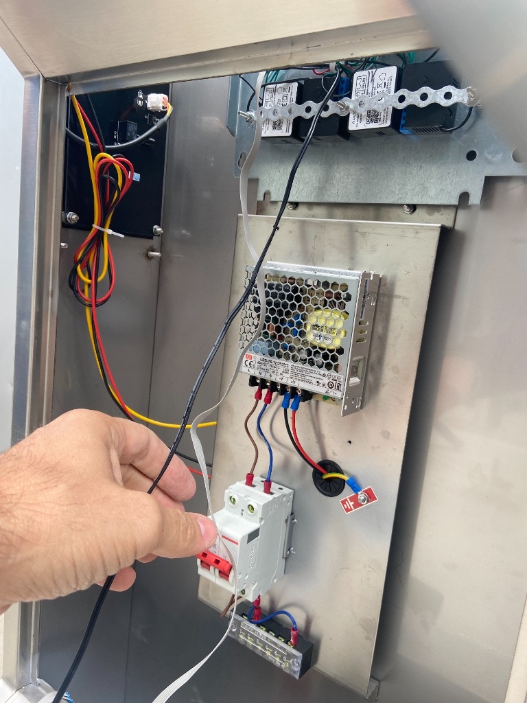 Installing a sensor data logger in a metal cabinet, with power supply and wiring